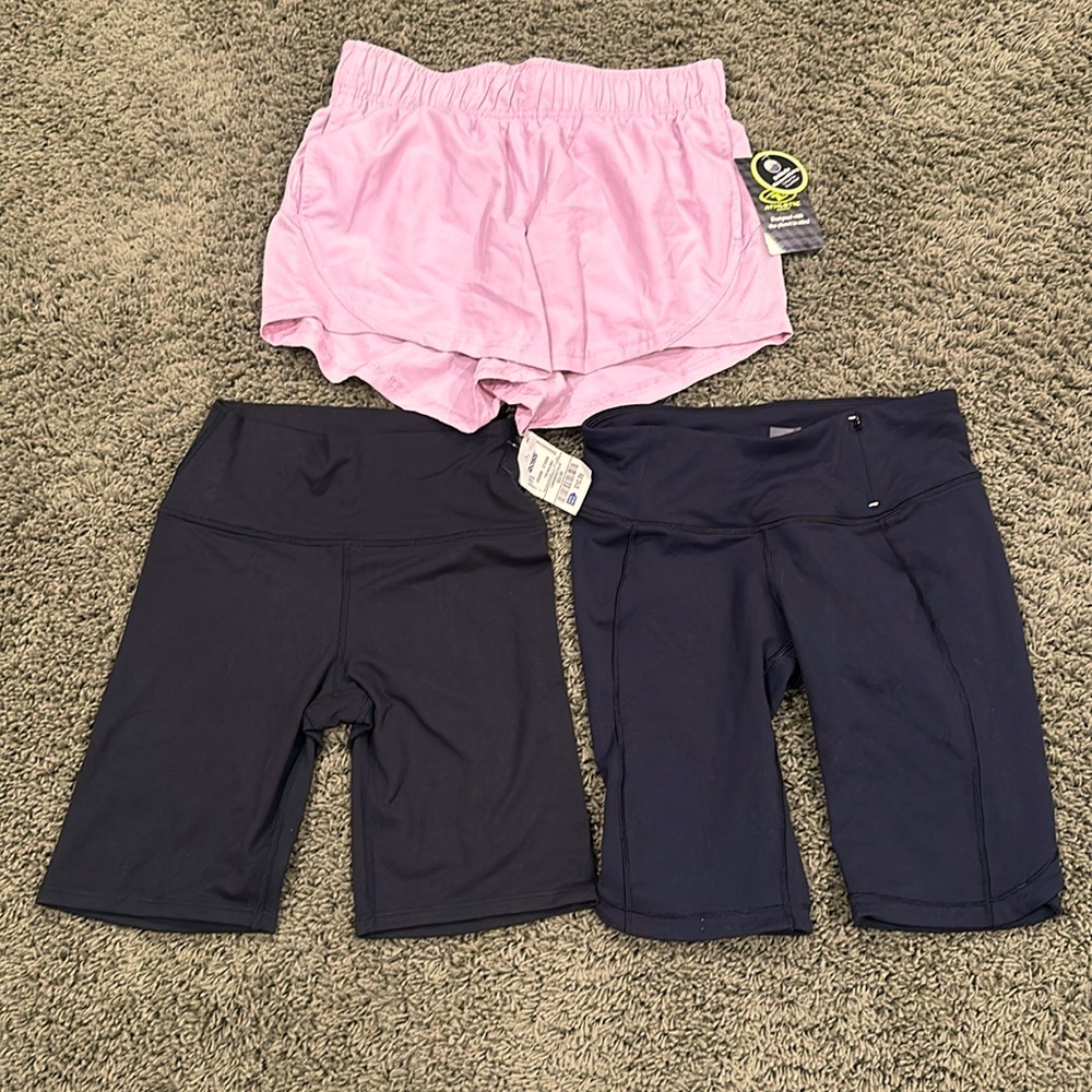 Three pair of extra small shorts for price of one. Two are new with tag.